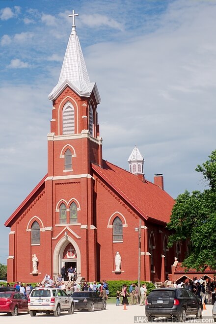 St. John Nepomucene Catholic Church, dedicated in September of 1915. The tower with its height of around 120 ft/ 36m serves as a landmark in flat Kansas surroundings.